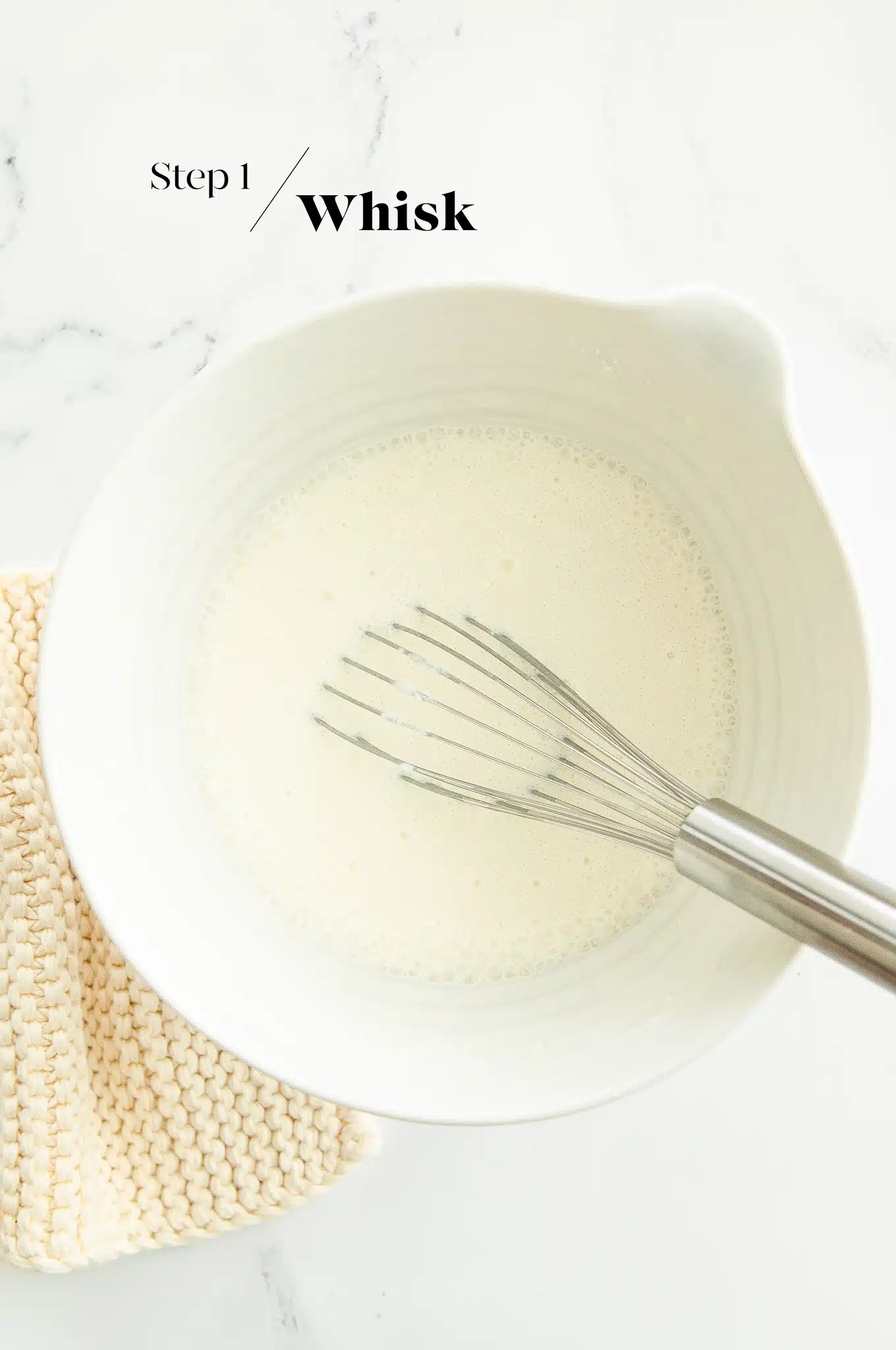 mochi batter in white mixing bowl