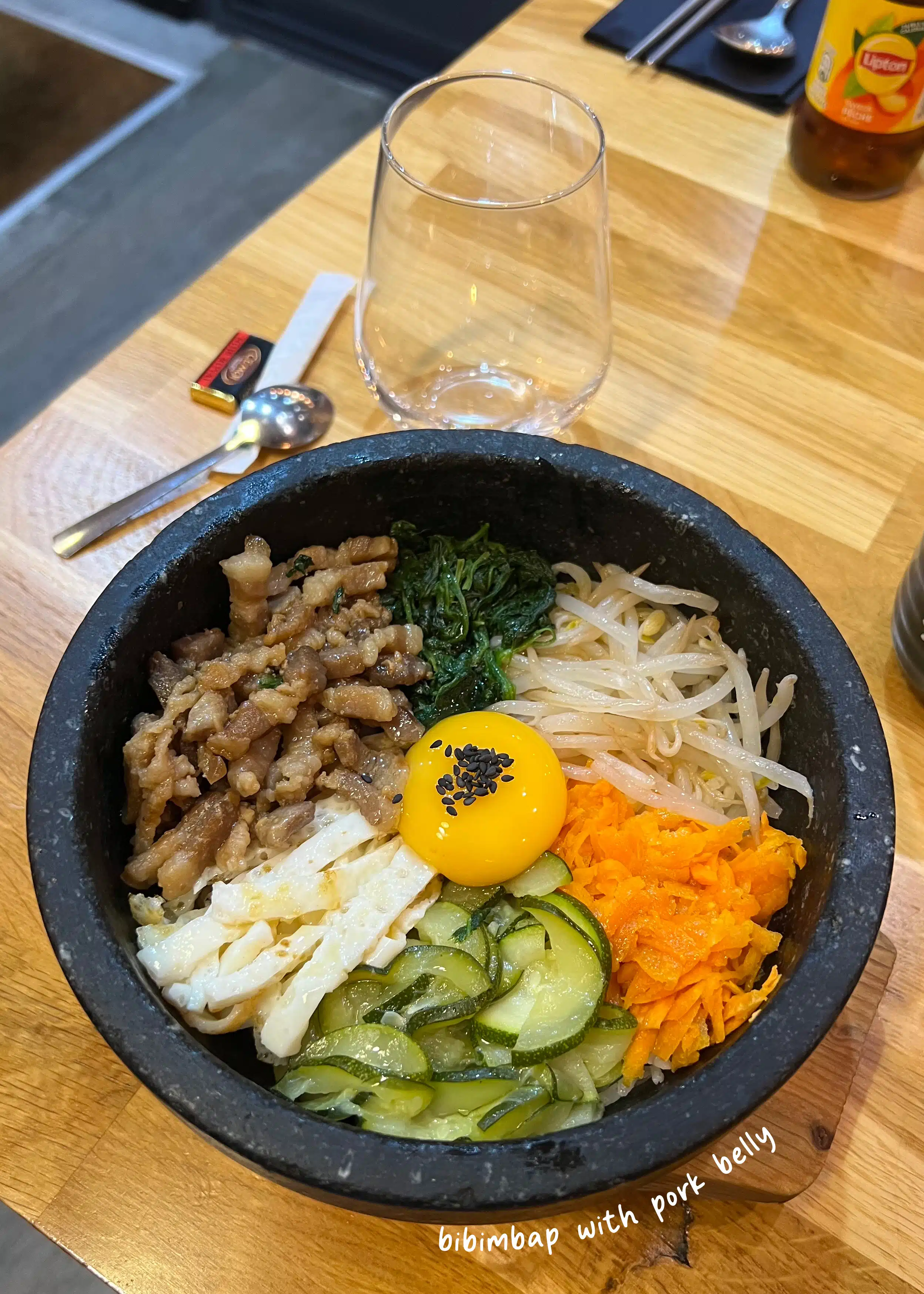 bibimbap with pork belly in stone bowl