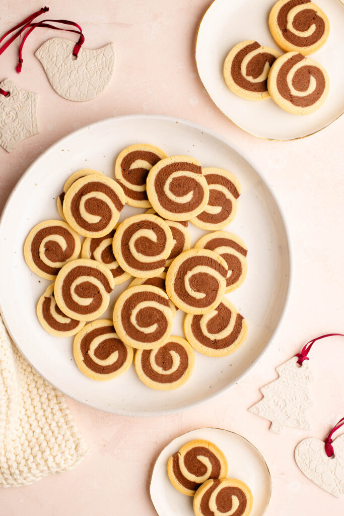 pinwheel cookies on plate with decorations