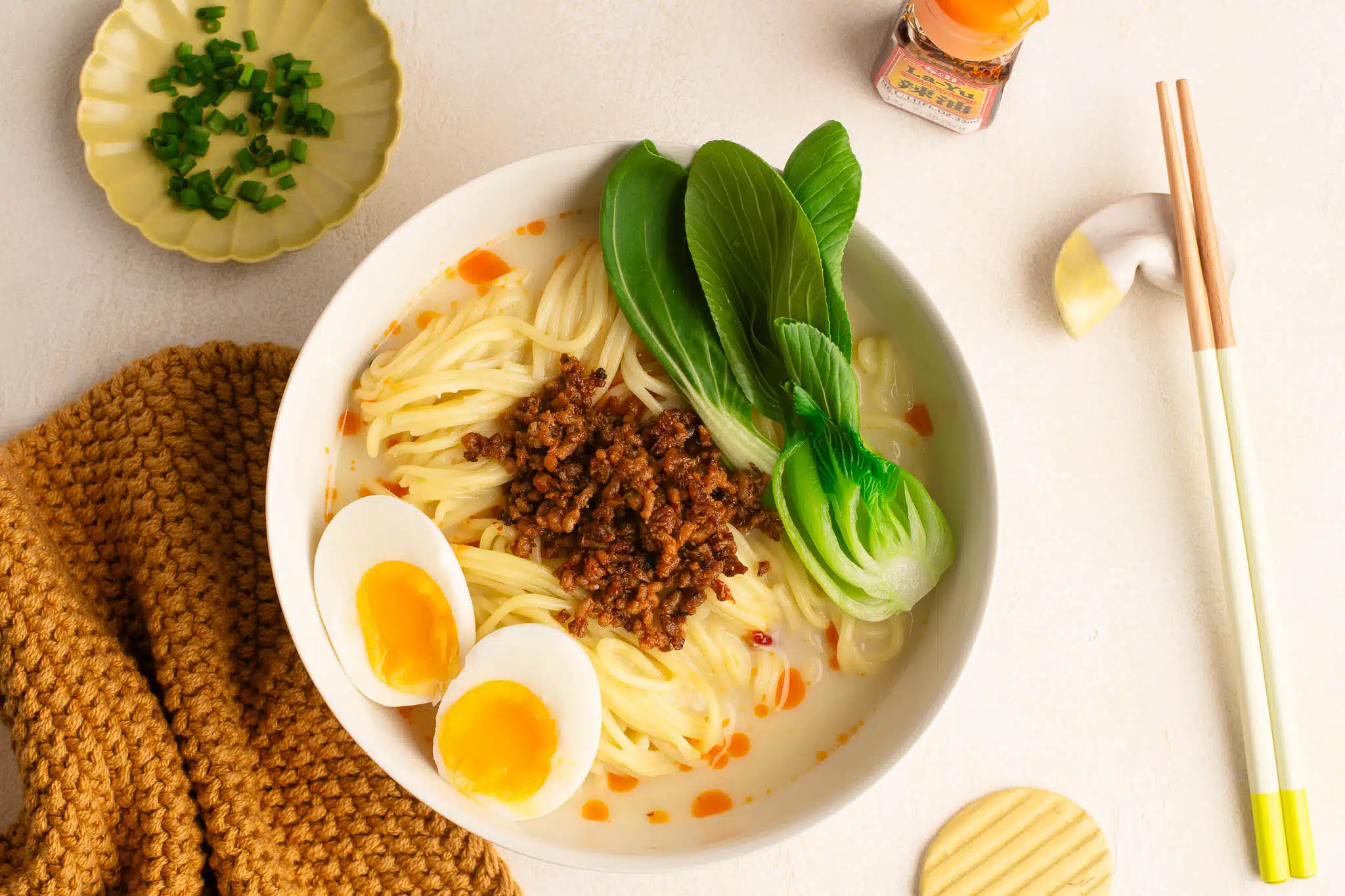 tantanmen ramen with vegetables and soft boiled egg