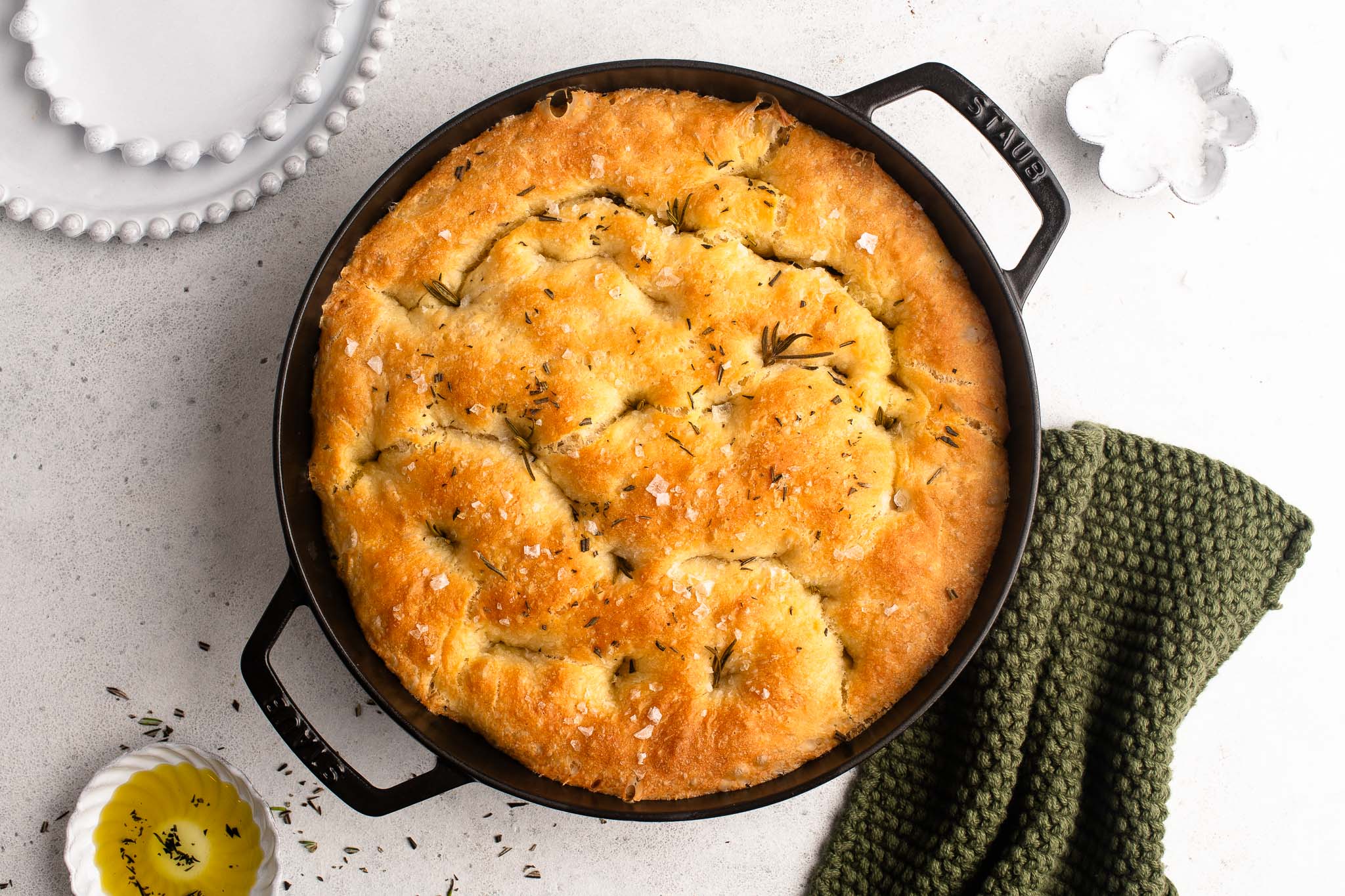 focaccia with rosemary and sea salt in cast iron skillet