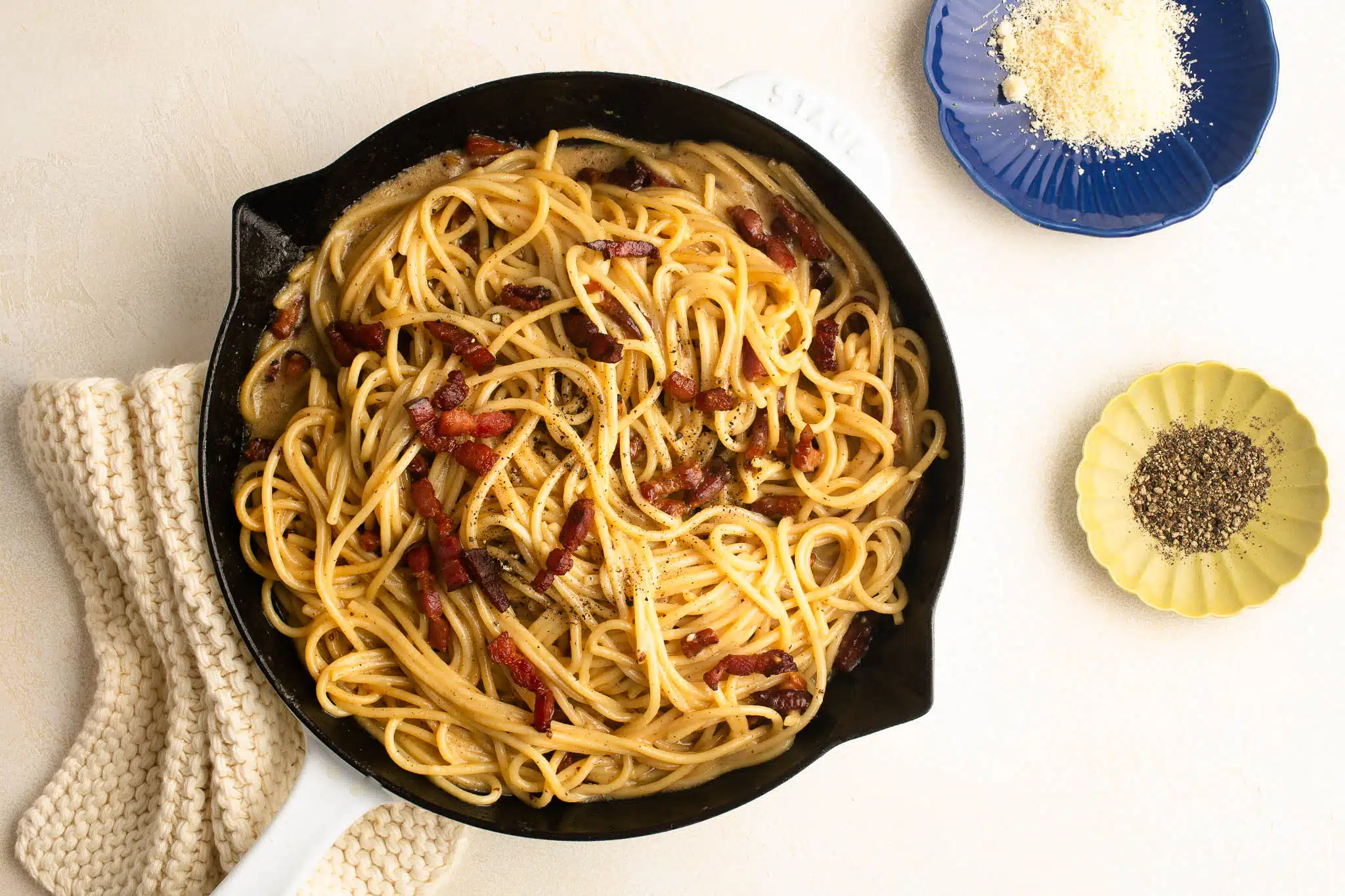spaghetti carbonara in pancetta in skillet