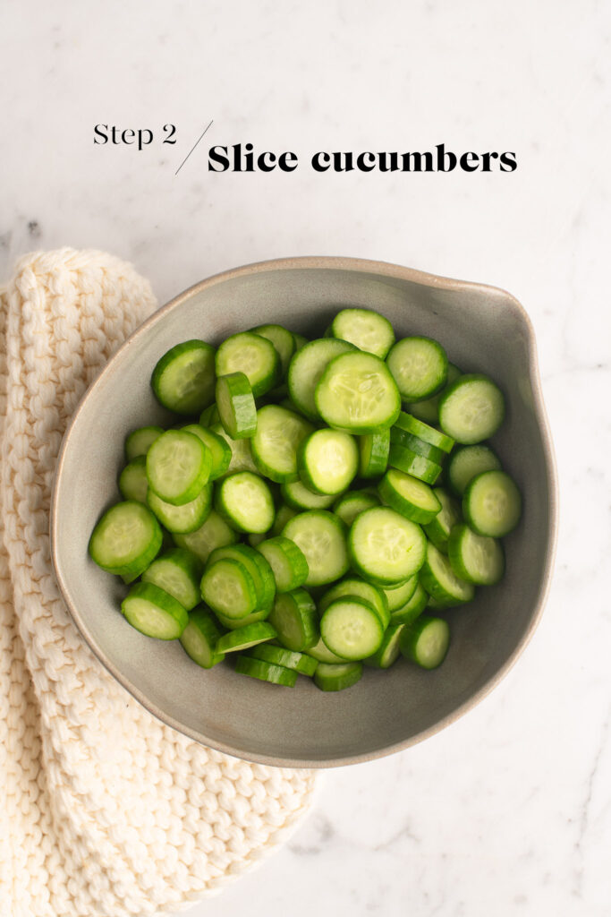 sliced cucumbers in small bowl