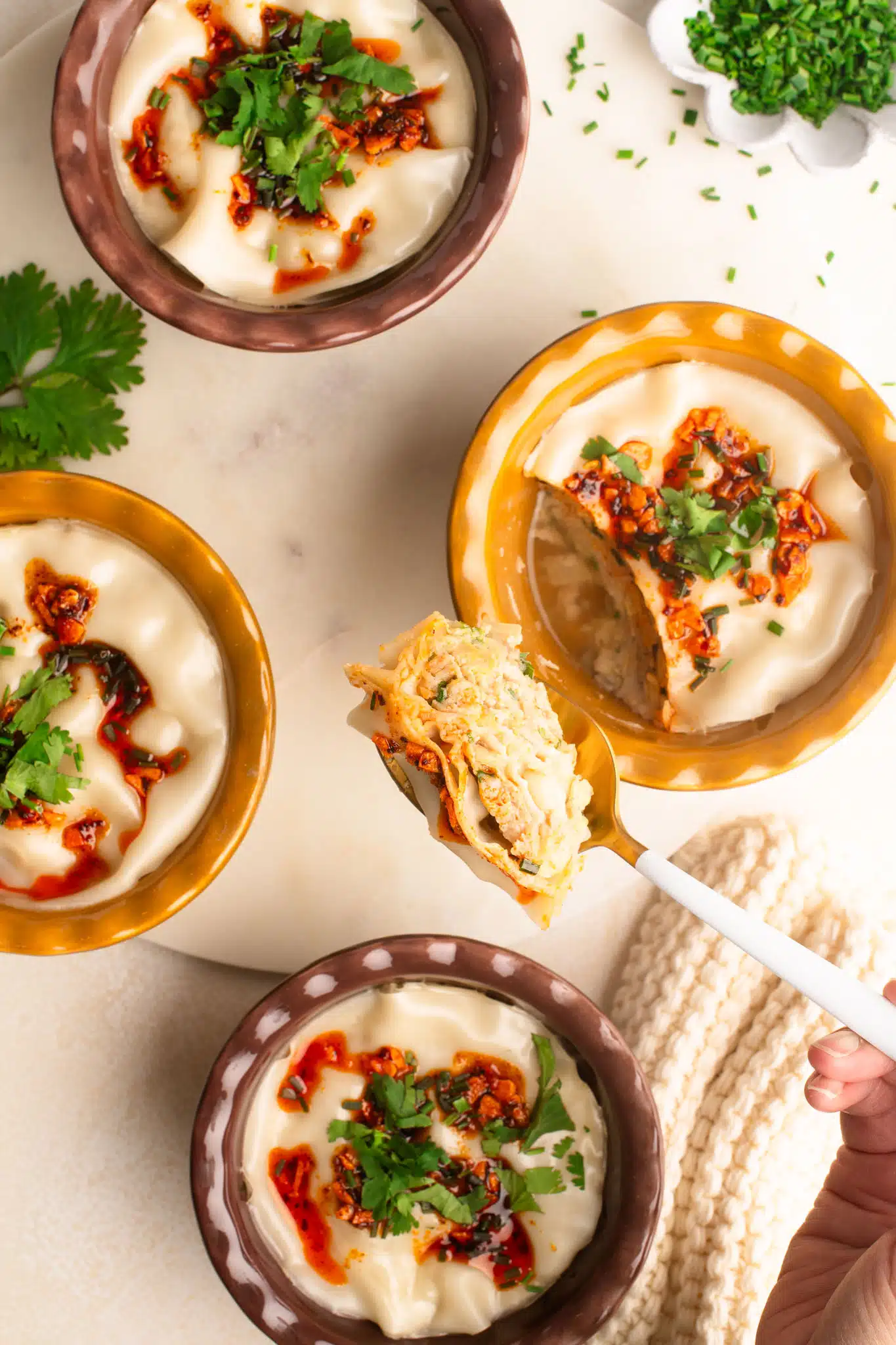 dumpling lasagna with a spoonful of filling