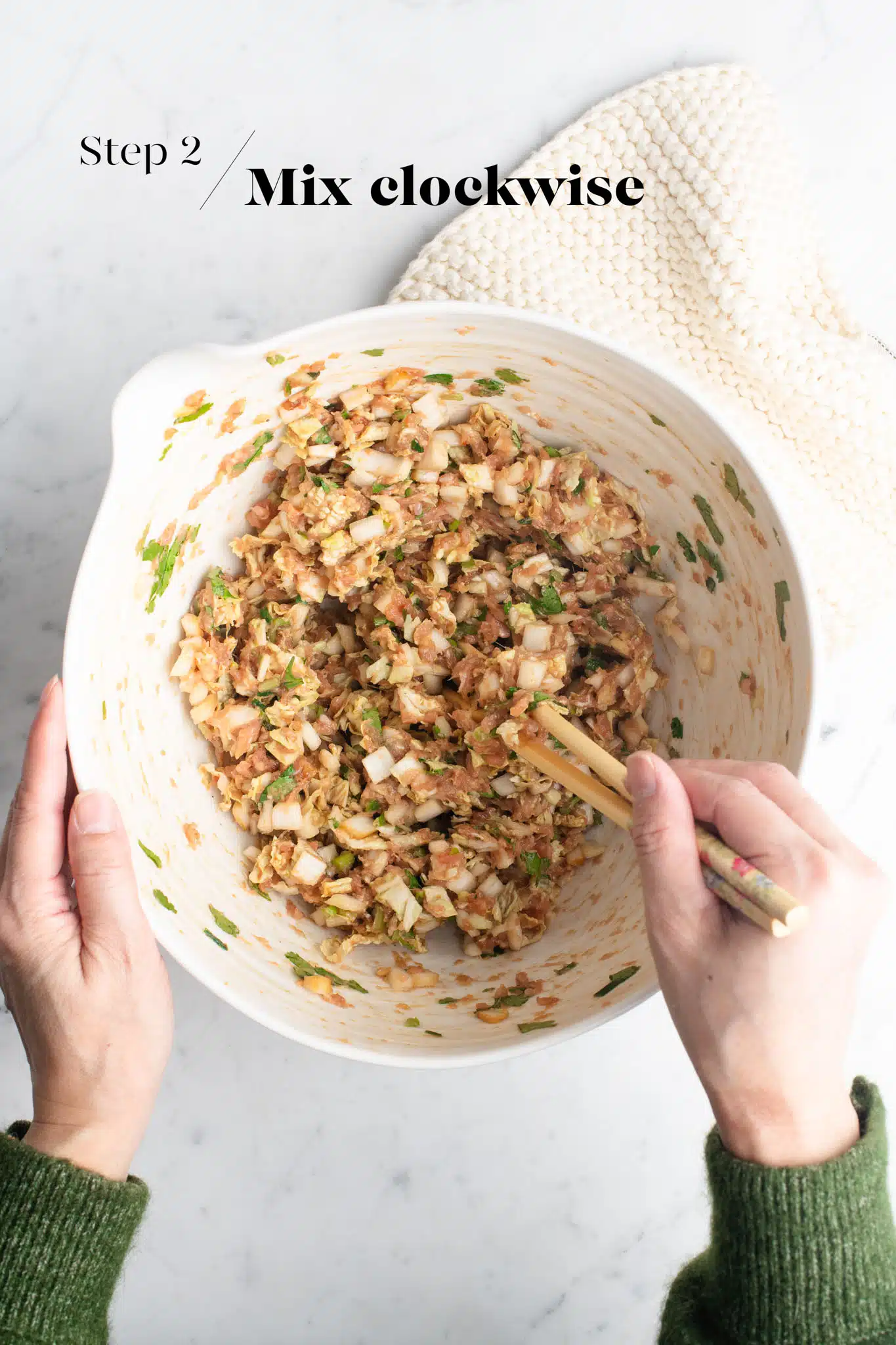 dumpling filling in white mixing bowl