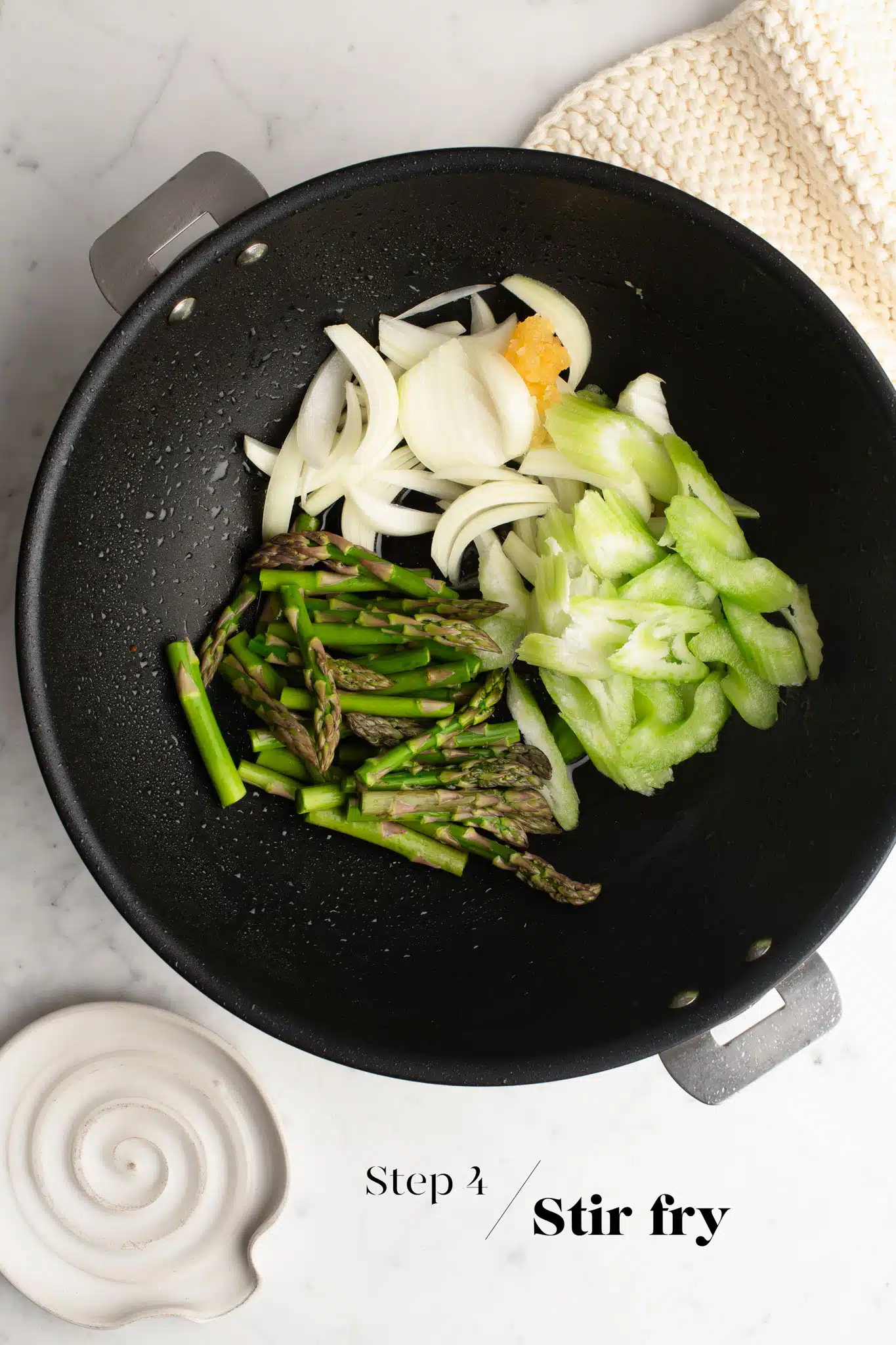 cooking vegetables in large wok