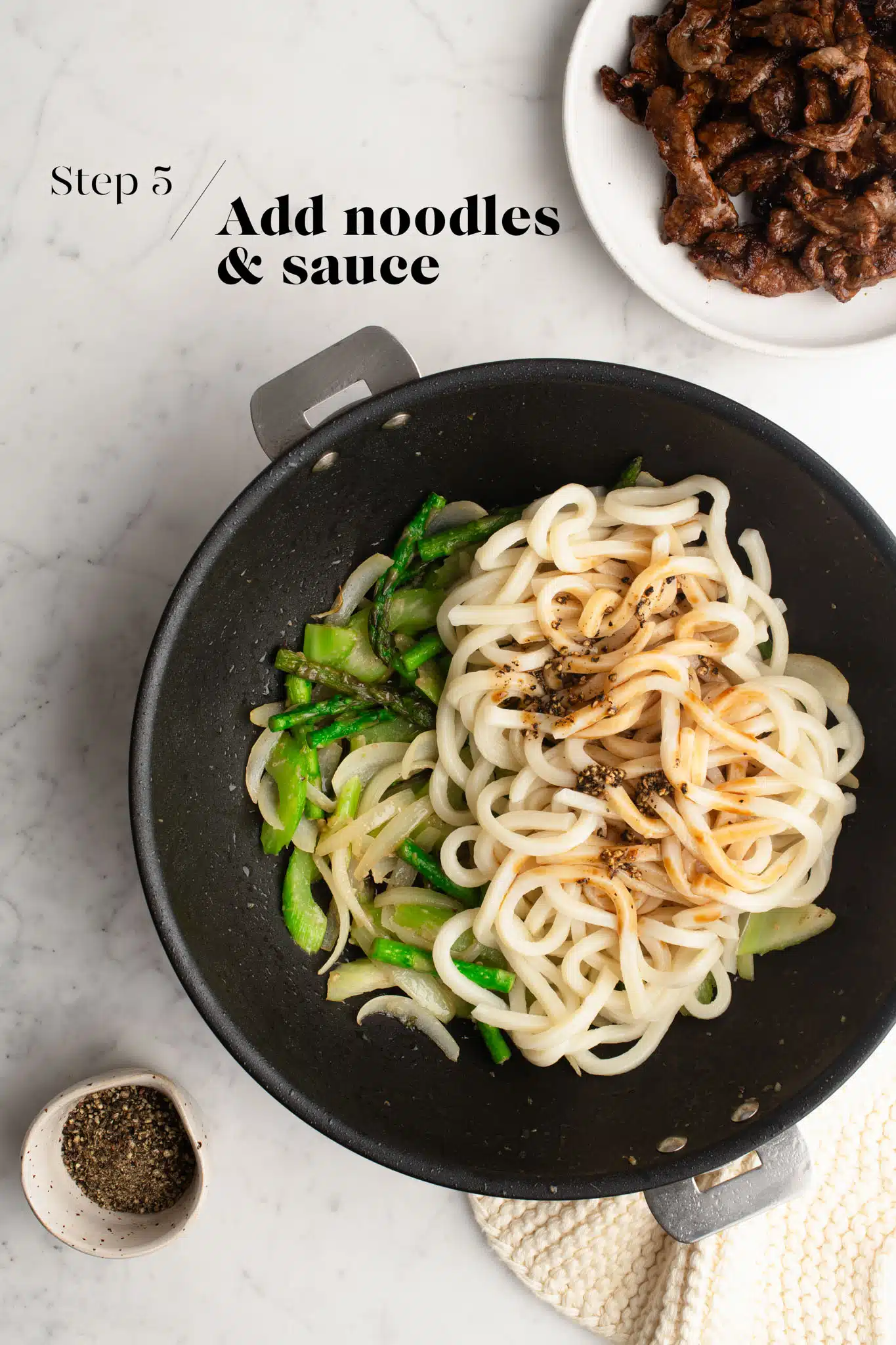 noodle stir fry in large wok