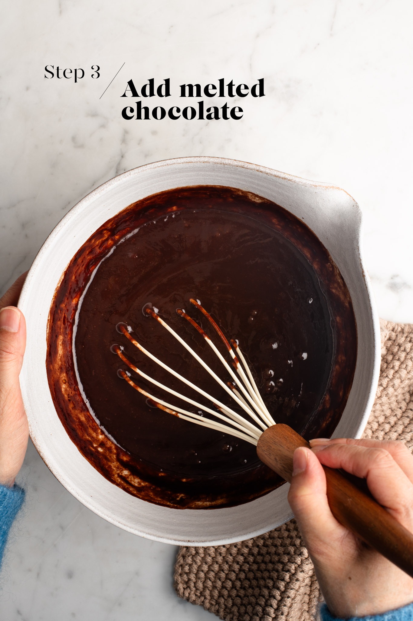 brownie batter in white mixing bowl