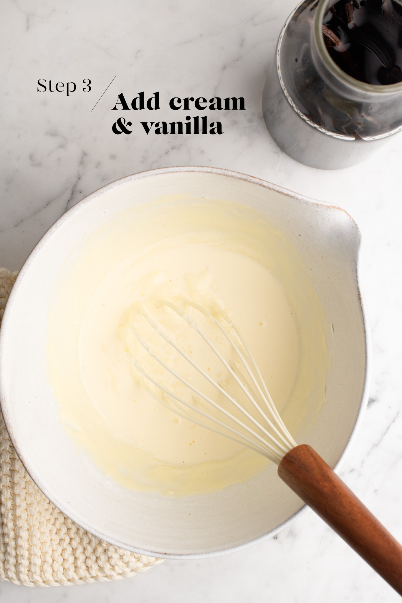 cheesecake batter in white mixing bowl