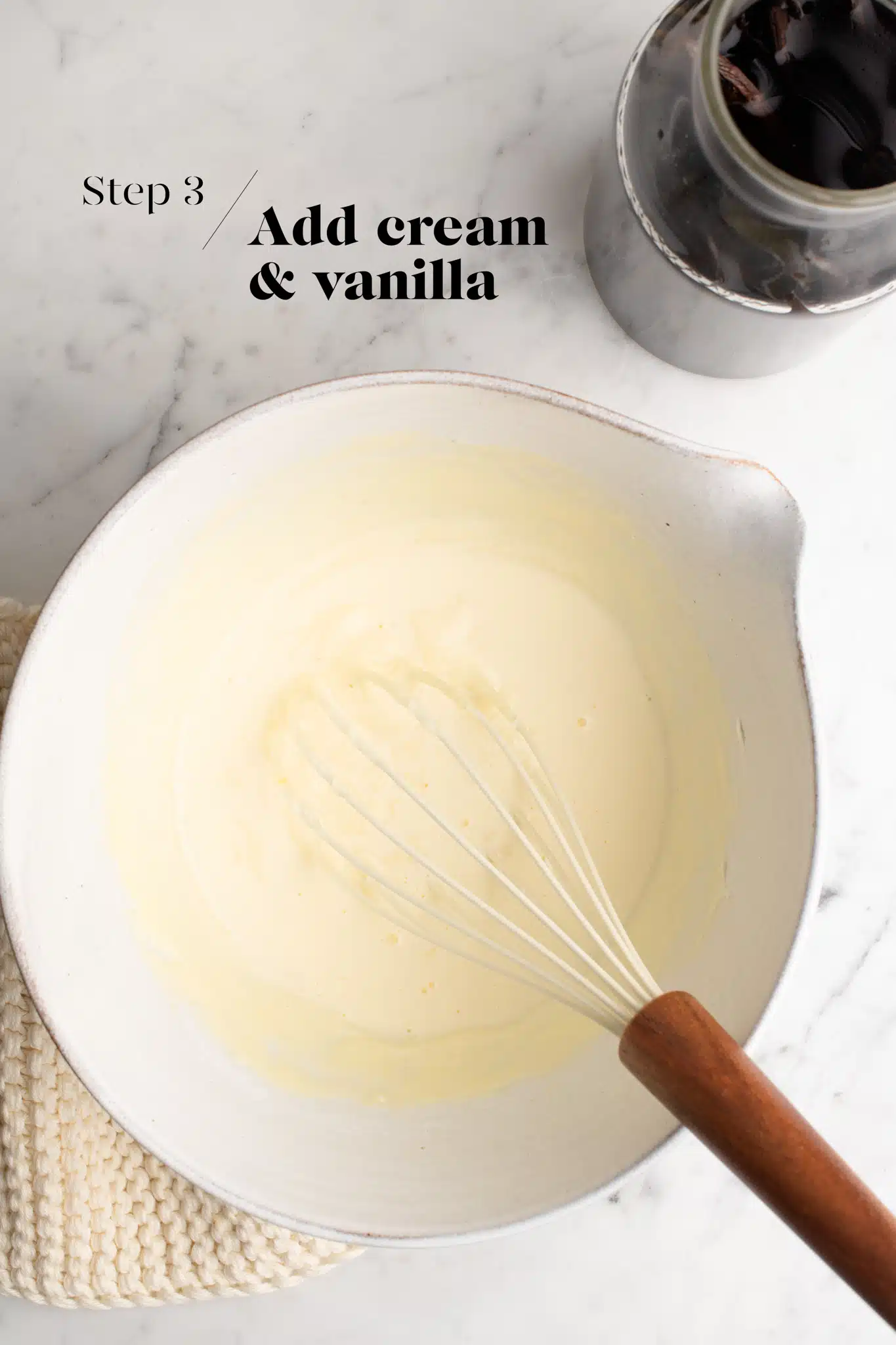cheesecake batter in white mixing bowl