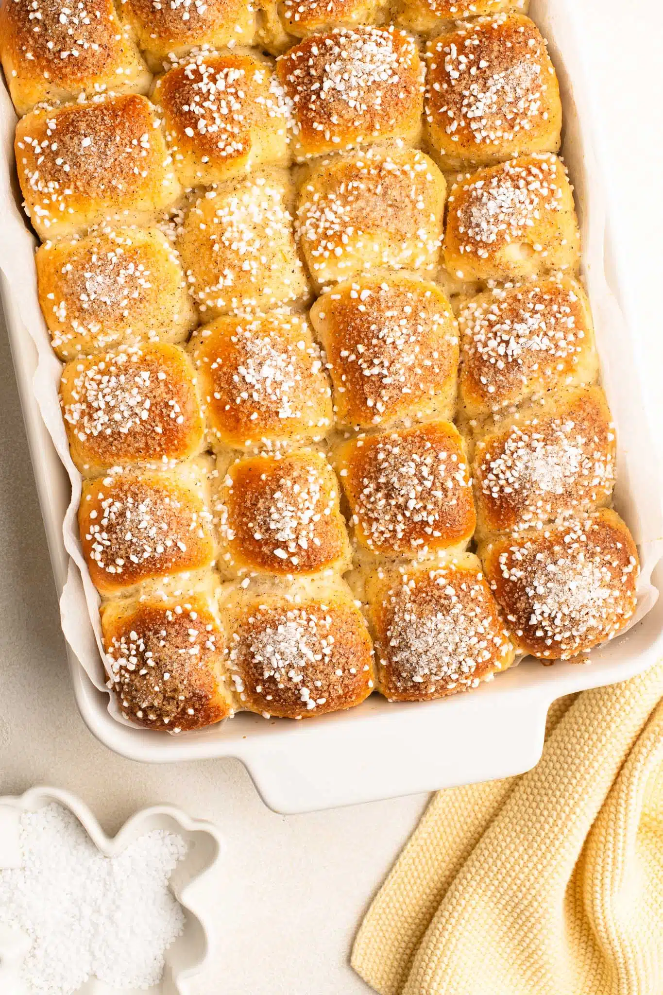 mini cardamom buns in white dish